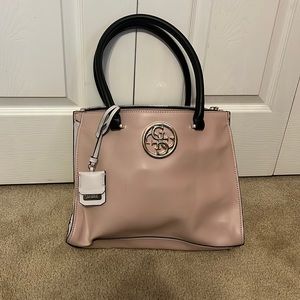 A pink guess purse